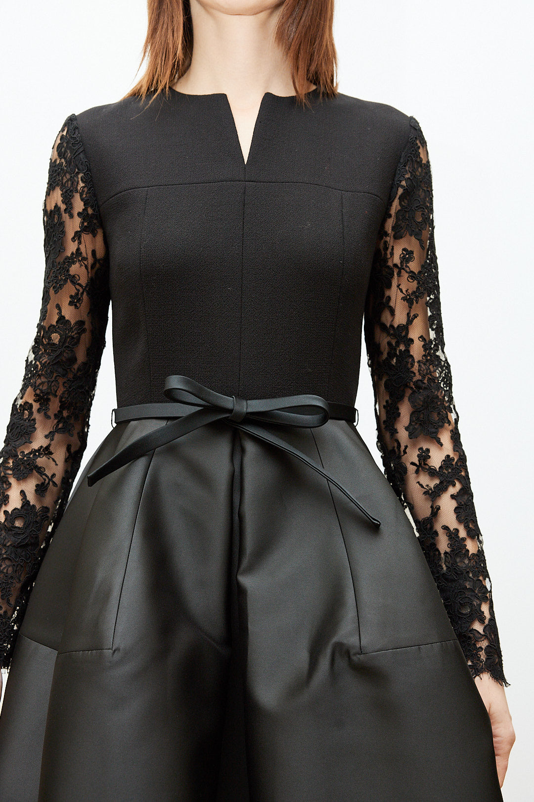 Black Dress with Lace Sleeves and Sculptural Skirt